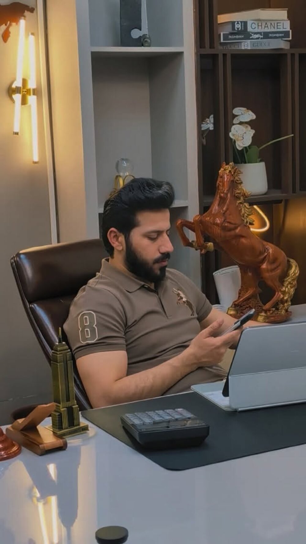Qasim Bajwa at his desk